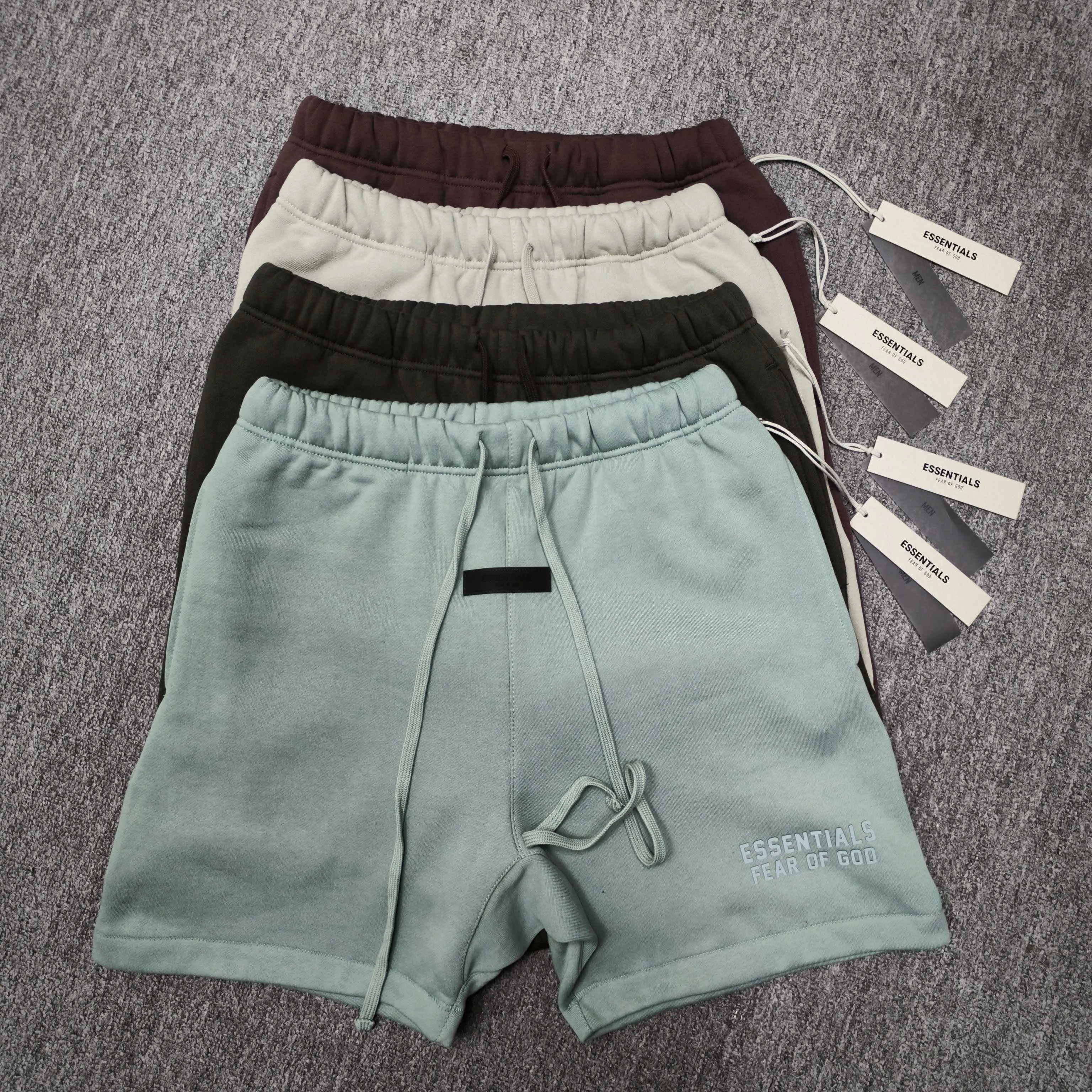 🦋Exclusive for cross-border supply, Hot Sale🦋80 【Purple】Essentials FW 23 Essentials Shorts Smoke Solid color elastic straight American heavyweight casual shorts for men and women Same Style ESSENTIALS was founded in Los Angeles, USA in 2018. The original intention of the establishment was to let more people wear affordable Versatile trendy items. In terms of fabric tailoring, it follows the same comfort and fineness as FEAR OF GOD, and the design is simplified from complexity, with the eye-catching "ESSENTIALS" LOGO running throughout. ESSENTIALS has been favored by fashion enthusiasts since its launch, and many European and American superstars are also its loyal buyers, such as KANYE WEST, JUSITN BIEBER, RIHANNA, etc. . . . . The most popular FOG color on the Internet is here, double-row silicone, the original custom-made fabric is soft and comfortable, no color difference, the custom-dyed rib collar is dyed in the same vat, the original Authentic designated flocking printing factory, there are few machines on the market that can produce a three-dimensional 3D feeling, the width and length of each letter and the 3D depth, etc., the ceiling of the industry, that is to say, you don’t need to look closely to know that it is 3D. In the details, we can see that the size of each corner of the hood is symmetrical and made of double-layer fabric. Factory’s great technology is that it can make each corner symmetrical so that it doesn’t look soft and floppy when worn, and it feels stiff. The original OVERSIZE version is full of high street style. Color: Light Black, Haze Blue, Plum, Seal Gray Size: XS-XL (maximum weight) Recommended: Same Style for men and women